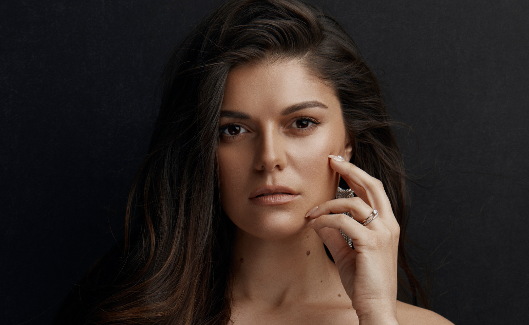 Kat Moran (Fiton Gjonbalaj)