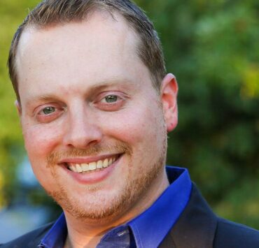 Luxury just crossed a threshold the industry has never faced before: five generations are simultaneously shaping what prestige means, and their definitions don’t simply differ. They collide. For Baby Boomers, luxury is still rooted in achievement, craftsmanship, and the symbols of earned success: a Rolex, the Hermès Kelly, the heritage hotel that feels like a private club. Gen X prizes functional excellence with minimal theatre. Millennials expanded luxury into experiential ecosystems of wellness, values, and meaning, not just products. Gen Z is rewriting the contract entirely, demanding ethical alignment and cultural fluency over legacy prestige. And Gen Alpha is emerging as the first generation that doesn’t distinguish between physical and digital status at all. Here’s the strategic reality: by 2030, Millennials and Gen Z are projected to represent roughly 80% of global luxury spending. That’s not a gradual shift. It’s a transfer of influence and market power happening in real time. Yet many luxury brands are still optimizing for the buyer profile of the past—customers who will soon represent a fraction of their revenue. The brands that win this transition won’t necessarily be those with the longest heritage or the highest prices. They will be the brands that can preserve a coherent identity across five value systems without diluting what made them valuable in the first place. In other words: they will be the brands that understand trust. Luxury has always been about trust. Not the marketing version of trust. The lived version. If there’s a single idea that should anchor luxury’s next decade, it’s this: heritage without relevance is just expensive nostalgia. Prestige Just Got Complicated The old prestige model was beautifully simple: exclusivity plus price equals desirability. Display the logo, demonstrate the cost, collect the status. That formula is dead. Today, prestige is multidimensional and unforgiving. Younger consumers reward substance over signaling. They evaluate brands not by press releases but by measurable performance—how brands behave, what they support, who they include. They want storytelling that connects heritage to contemporary culture without the corporate museum tour. Increasingly, they expect digital sophistication that strengthens (not replaces) human connection. This has created an uncomfortable truth for many legacy brands: reputation now expires faster than it used to. Prestige isn’t inherited anymore. It’s continually renegotiated. Luxury is no longer a guarantee of loyalty. It’s a test of relevance. We can already see the fault lines. “Hard luxury” categories such as watches and jewelry often retain cross-generational loyalty because craftsmanship translates across age. But fashion, beauty, and accessible luxury are experiencing unprecedented switching. Trend acceleration, resale culture, and price scrutiny are making younger consumers ruthlessly pragmatic. They’ll wear vintage Chanel but purchase new from The Row. They’ll inherit a Patek Philippe but spend their own money on a pre-owned Rolex. The implication is clear. Product alone no longer protects market position. Category dynamics matter, but customer experience is more significant. Luxury is still supposed to feel like a relationship. And too many brands have forgotten that. The $80 Trillion Question: Influence Comes Before Inheritance Everyone in luxury knows about the great wealth transfer, more than $80 trillion projected to move between generations by 2045. But too many brands talk about it as if it were a future event. They’re missing the real story: influence precedes inheritance by decades. Within UHNW households, young adults increasingly shape decisions on travel, art, fashion, dining, philanthropy, and real estate long before they control assets. The 28-year-old heir may not sign the wire transfer for the villa, but they are choosing the destination, the architect, and the sustainability standards. Luxury brands focused exclusively on current wealth holders are quietly losing family lines of loyalty. The mistake isn’t ignoring young consumers. It’s treating them as a separate segment rather than the decision influencers they already are. The smartest operators aren’t waiting for assets to change hands. They are building relationships before the money moves. Brands Don’t Notice Until It’s Too Late Luxury relevance rarely collapses overnight. It fades through muted cultural presence, creative stagnation, and misalignment with emerging values. By the time leadership sees sales decline, the brand has already lost years of momentum. And rebuilding takes time. Three to seven years, minimum. That’s why short-term tactics often fail. Brands attempt shortcuts through hype cycles or rapid creative pivots, and the market punishes inconsistency harder than it rewards boldness. The strongest recoveries share a pattern: coherent long-term direction, elevated craftsmanship, renewed emotional storytelling, credible ESG integration, controlled distribution, and pricing integrity. Notice what’s missing: trend-chasing, influencer saturation, and defensive discounting. Hermès, Chanel, Rolex, Patek Philippe, Louis Vuitton, Porsche succeed because they understand strategic restraint. They know what is untouchable in their DNA. They evolve aesthetics without abandoning foundations. They participate in culture intelligently, not reactively. Luxury isn’t built through constant reinvention. It’s built through disciplined relevance. What Department Stores Reveal About the Industry The luxury press loves to frame recent department-store disruption as “distribution model failure.” It’s a convenient story. It’s also incomplete. The deeper issue isn’t logistics. It’s not merely balance sheets. It’s the breakdown of luxury’s core differentiator: relationship. In the past, the department store existed to give customers access to maisons they couldn’t easily reach, and to deliver a level of service worthy of those maisons. But today, many customers can go directly to the brand online and be treated with extraordinary care. So why would they pay the same price (or more) to be treated as anonymous? To put it bluntly: if you remove service, what makes luxury better than a mass retailer? And customers notice. They don’t stop buying luxury altogether. They stop buying luxury from places that don’t respect them. As I’ve said privately and publicly: the luxury market hasn’t “softened.” Consumers still spend. They just don’t waste money. That’s the shift many leadership teams still don’t fully acknowledge: today’s luxury buyer is highly discerning, highly informed, and fully willing to redirect loyalty. Tech Isn’t the Enemy of Luxury—Misuse Is Some luxury brands claim they “can’t scale intimacy.” They say relationships are too expensive, too complex, too personal to deliver at scale. This is no longer true. The real innovation in luxury isn’t visible technology—it’s invisible technology that enables a more human experience. When done well, clients don’t see AI. They feel remembered. There are brands already executing this brilliantly: you walk into the store, and you are greeted by name. The associate knows your last purchases, important dates, preferences, and likely intent without ever holding up a tablet like a script. That doesn’t happen by magic. It happens because technology now allows luxury to deliver personalized service at scale if the brand chooses to invest in it. The brands who say they can’t do this aren’t blocked by technology. They’re blocked by priorities. The Strategic Recalibration Most brands approach the generational transition with the wrong question. They ask: “How do we attract younger consumers?” The better question is: How do we remain coherent across five different definitions of prestige? The answer lies in identity clarity. The brands leading the next decade already know what cannot change about them. They modernize thoughtfully. They evolve design and storytelling without erasing heritage. They invest in ESG with measurable action because transparency has replaced reputation as trust currency. They create omnichannel personalization that adapts the client experience to life stage without fragmenting brand voice. Most importantly, they rebuild luxury where it belongs: in the relationship. What Happens Next Between now and 2035, luxury will complete its transition from a heritage-led industry to one shaped by values-driven, digitally native consumers who view prestige as emotional and ethical. The future luxury ecosystem will be more experiential, more ethical, more digital, more community-driven, and globally interconnected. It will be shaped more by identity and wellness than by traditional status markers. And it will be led by brands with consistent identities rather than those who mistake adaptability for strategy. Gen Alpha is already arriving fully shaped by AI, immersive technology, and hybrid physical-digital identities. Their definition of luxury will make today’s debates about quiet luxury versus logomania seem quaint. The strategic imperative for luxury leadership is straightforward: clarify what is untouchable, evolve what is necessary, and protect long-term vision against short-term pressure. In the end, the brands that survive this collision won’t be the loudest. They’ll be the ones that remember luxury’s oldest truth: trust is built one detail at a time. Christopher Olshan is the CEO of The Luxury Council, which provides strategic intelligence and advisory services to luxury brands, hospitality properties, and C-suite executives navigating generational transformation, UHNW market dynamics, and competitive positioning across global luxury markets. He is the author of White-Glove Trust (releasing globally in February 2026).